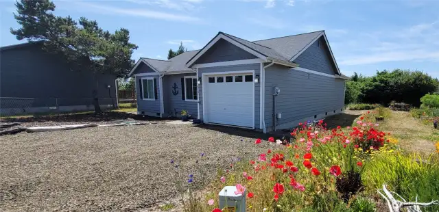 Effortless coastal living meets prime canal frontage in this stylish single-level retreat. With a low-maintenance yard and direct water access just steps from your door, it's the ideal Surfside escape for those who crave both convenience and natural beauty.