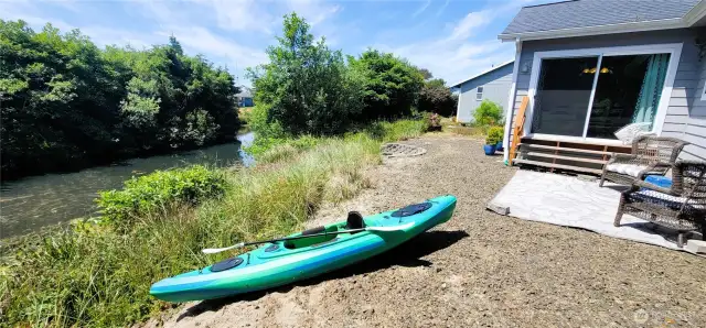 Tucked along the tranquil canal, this outdoor escape offers immediate water access for kayaking and front-row views of local waterfowl gliding through the reeds. With a cozy yard, fire-pit and vibrant greenery, it’s a low-maintenance retreat where nature and relaxation flow together in perfect Surfside harmony