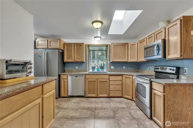 Stainless appliances add to the appeal of this kitchen.