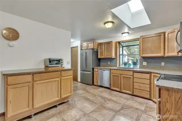 Plenty of cabinetry for your storage needs. A skylight lets in the natural light.