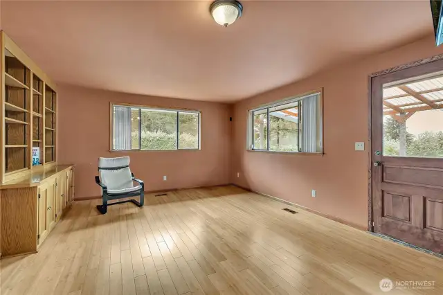 The family room has access to the covered deck for convenient indoor-outdoor living.