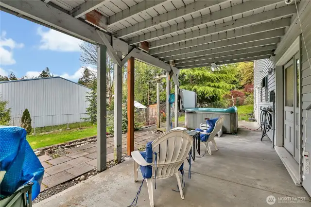 Covered patio off the lower level family room.