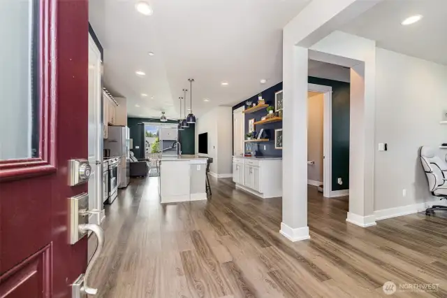 Welcome to this exceptional home that still feels brand new, featuring recessed lighting throughout, luxury vinyl plank flooring upstairs, and expansive windows that fill the space with natural light.