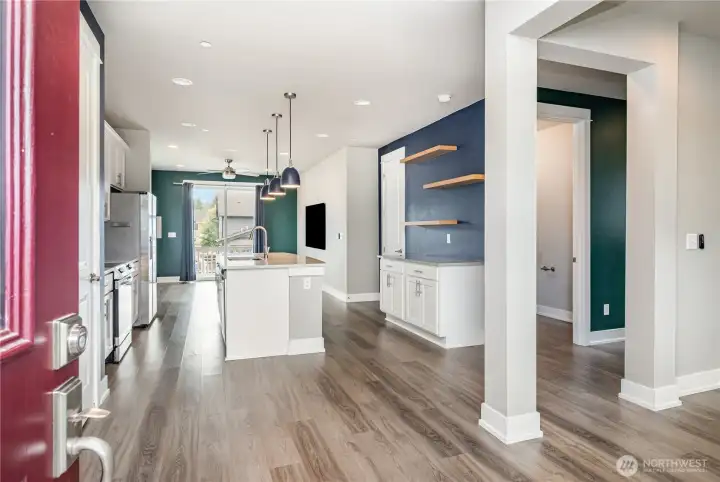 Welcome to this exceptional home that still feels brand new, featuring recessed lighting throughout, luxury vinyl plank flooring upstairs, and expansive windows that fill the space with natural light.