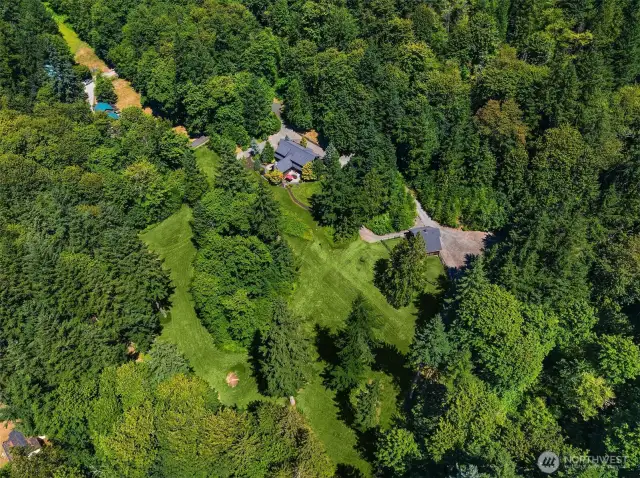 Timeless Treasure at Tiger Mountain. Craftsman custom home sited to perfection on 5 pastoral acres minutes to Downtown Issaquah.