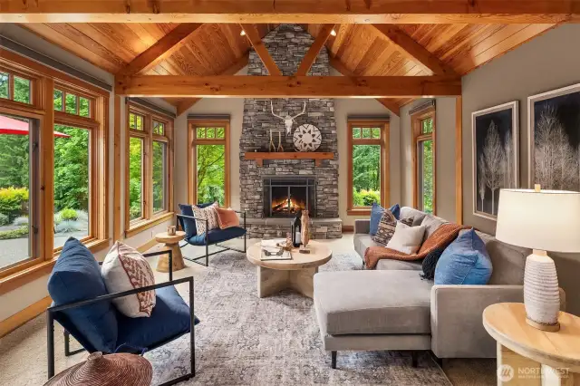 Kitchen Great Room boasts stone & wood timber w/ south facing foothill views & paragliders overhead
