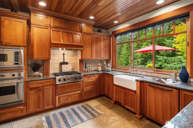 Great Room kitchen boasts Squawk Mountain vistas and lush landscape and territorial views