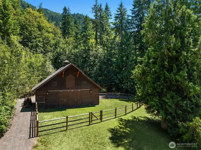 3 stall capacity Barn Pros Barn with Wood rail fenced paddock area off stalls & Tack area with stairwell to full length loft