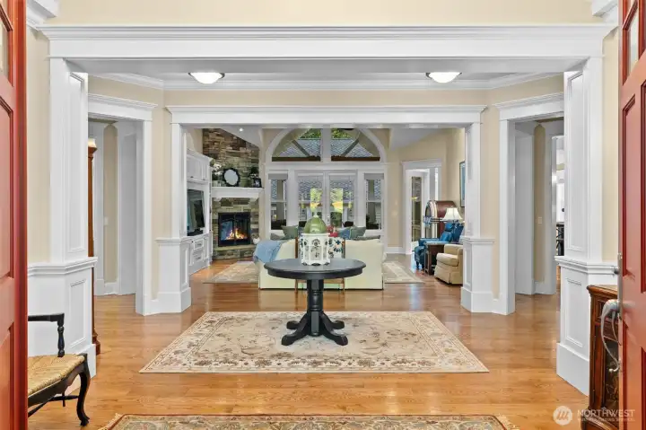 Formal entryway shows off the extensive trim and woodwork in the home.