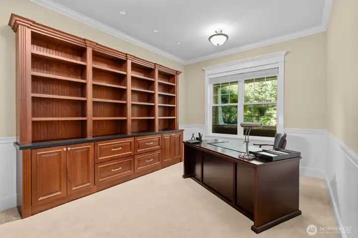 This office is not counted as one of the four bedrooms.  Comes with custom built cabinets and bookcase.