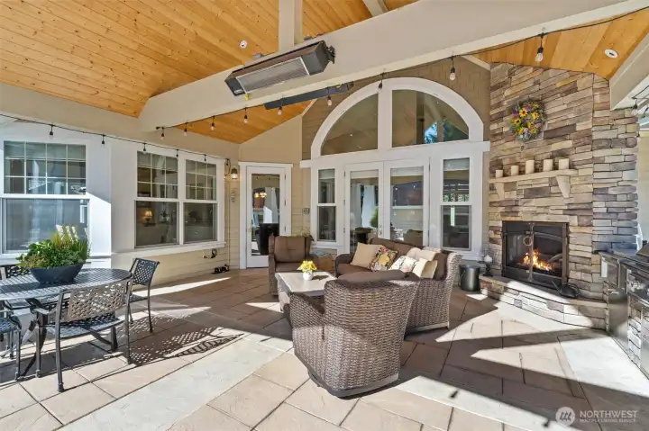 Covered patio is great for entertaining.  Notice the cedar ceiling, extra lighting, and built-in gas heaters.