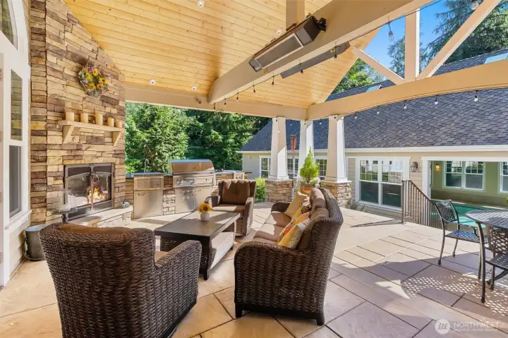 Enjoy the outdoor gas fireplace.