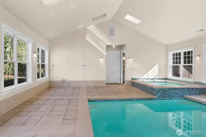 This space poolside would be perfect for TV and sitting area to watch the ball game.  Or set up exercise equipment to get a workout in before swimming laps!