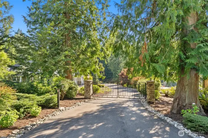 Security gate at entrance of property.  Tesla charging station is already in place!