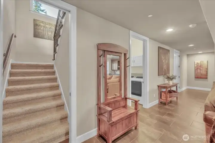 Downstairs Laundry room on the left past the stairs