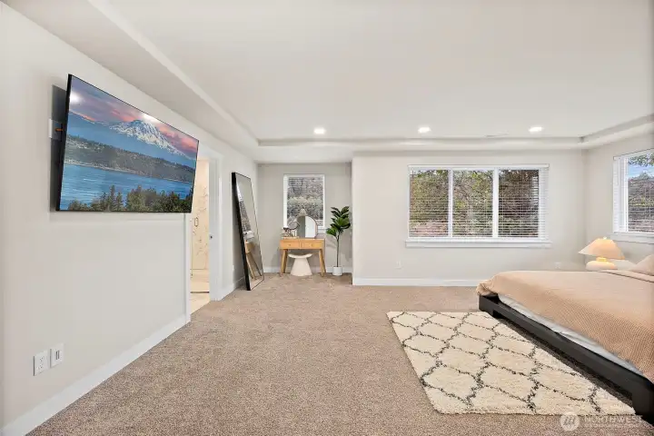 Sprawling primary suite with luxurious bath and massive walk-in closet