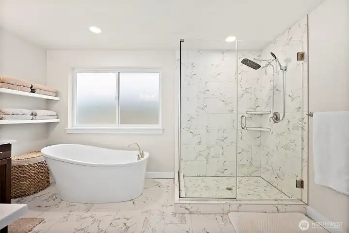 Sprawling primary suite with luxurious bath and massive walk-in closet