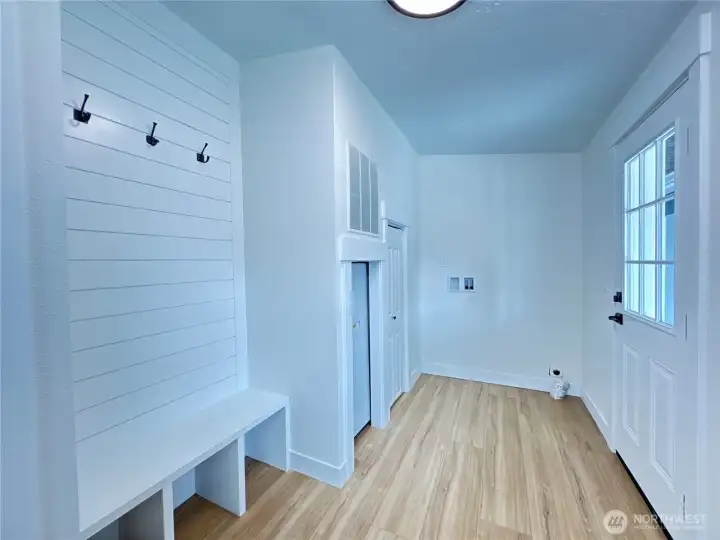 New drop zone greets you when you enter the house through the carport side. Ready to quickly install side by side laundry machines of your choosing.