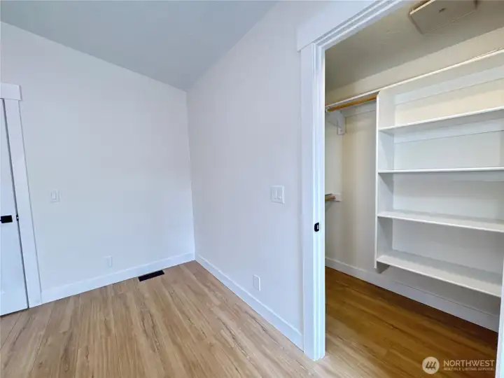 Primary bedroom closet, with brand new closet kit.