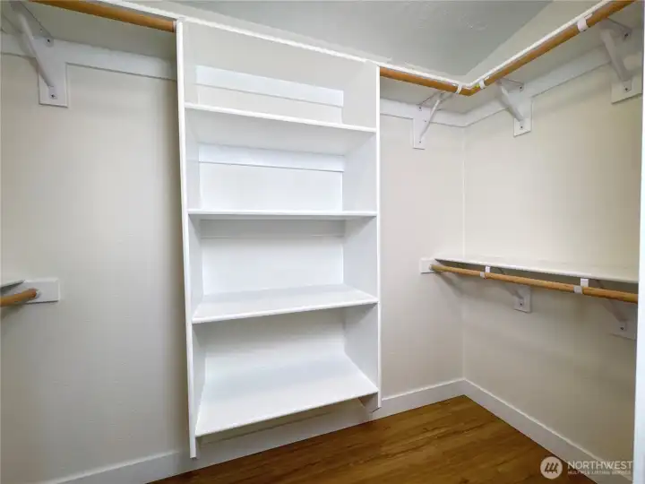 Primary bedroom walk in closet. New closet kit!