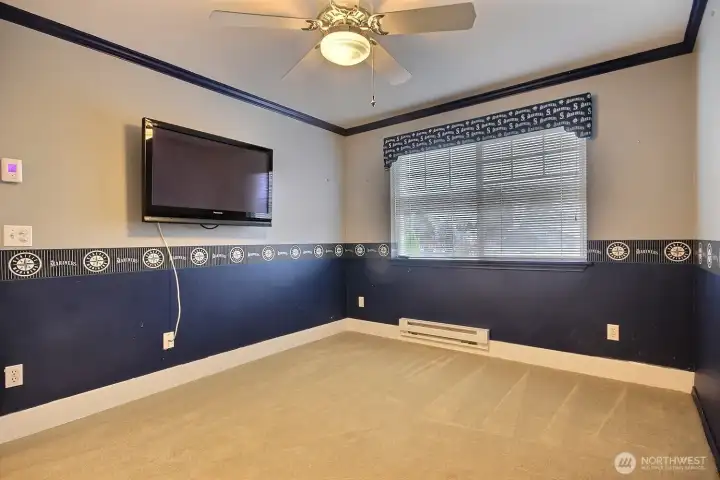 Seahawks bedroom with  sliding door closets