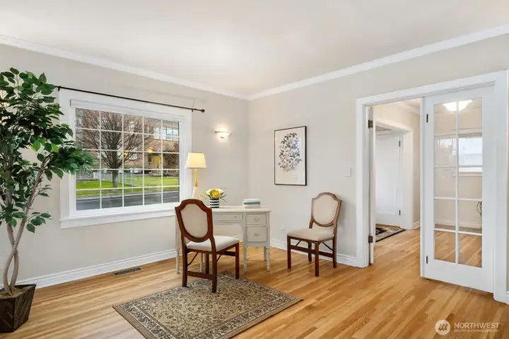 Formal living has room for grand piano, additional seating or formal dining