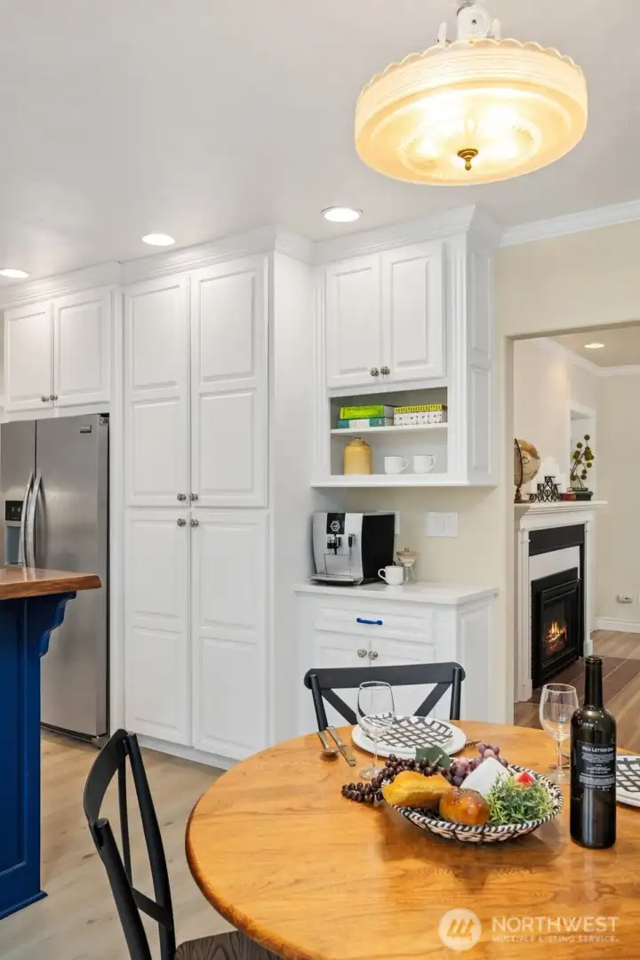 Beverage bar in kitchen adjacent to formal living