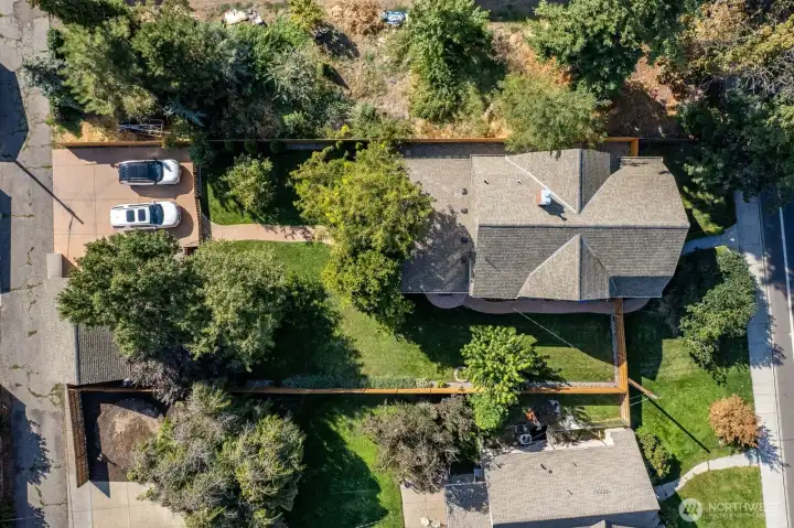 Alley access to lots of parking - uncovered concrete parking pad is newer