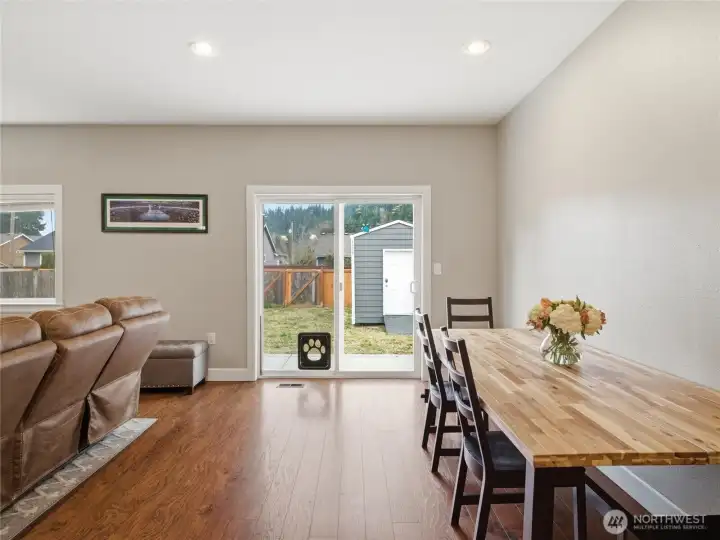 Sliding doors to the fully fenced backyard, connect you to easy outdoor living