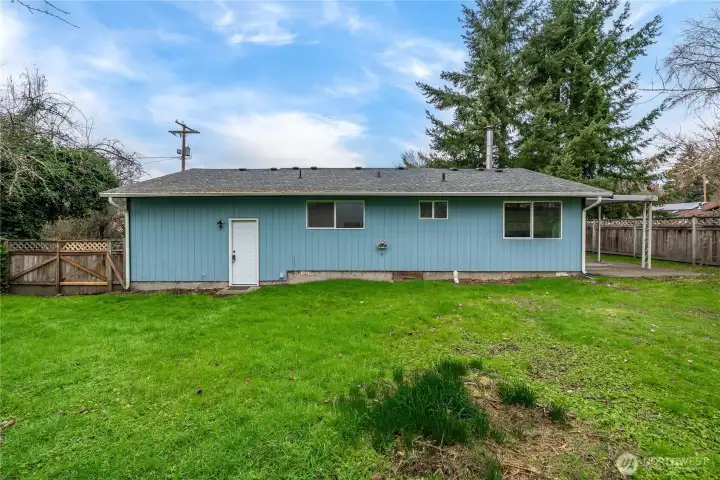 Expansive, fully fenced backyard offering privacy