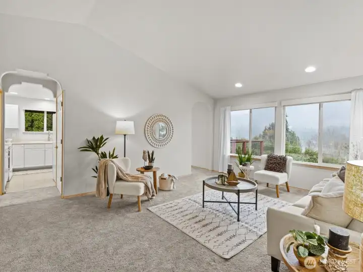 From the moment you walk in, you'll notice the gorgeous lake views from every room on the back of the house- even on a rainy day.