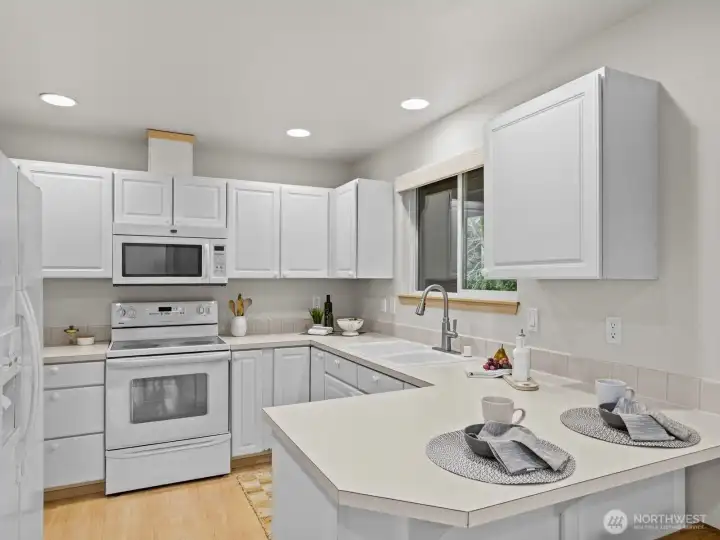 There's an abundance of cabinet and counter space for all of your cooking and baking needs.