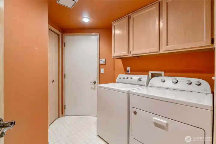 Main level utility room off the garage.