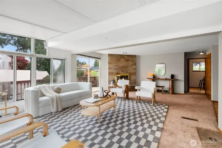 Main level living room with.  Access to side deck and back deck.