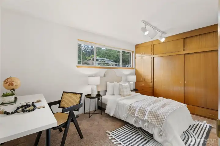 Bedroom #2 on the main floor with build in closets