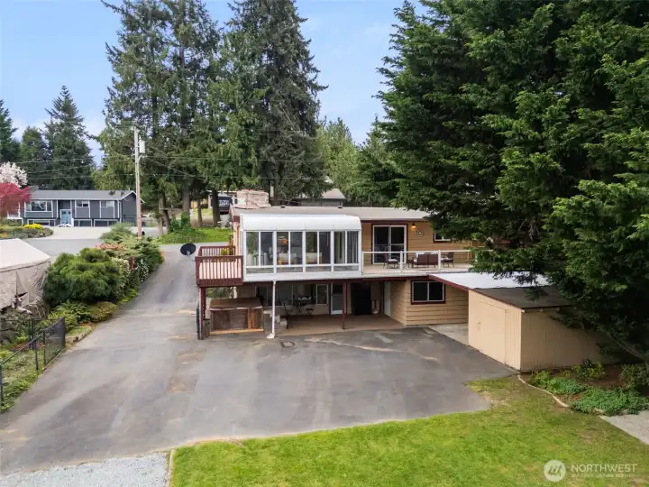 Driveway on left.  Convenient for a straight path from road to RV spot.