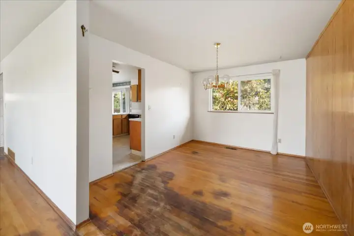Dining room located off kitchen and living room in main home