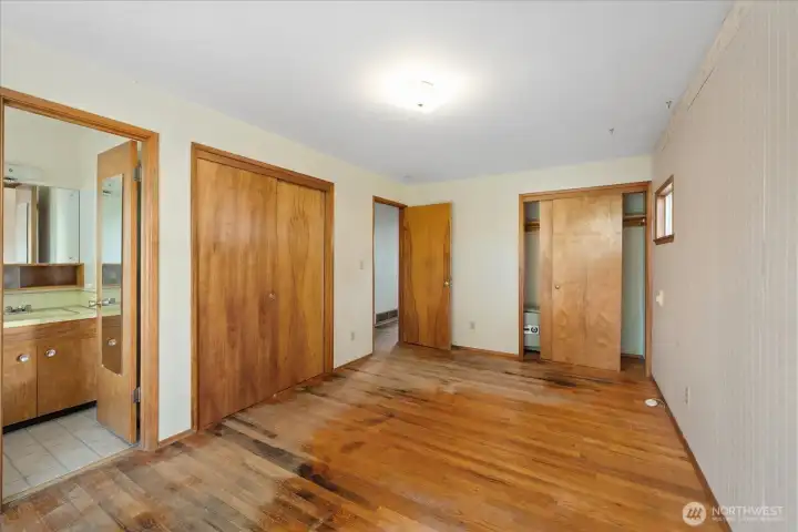 Two closets in primary bedroom in main home
