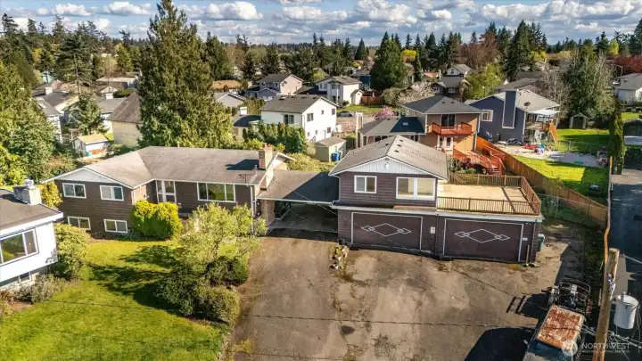 Main house on the left and ADU located over the garage with a covered carport in between