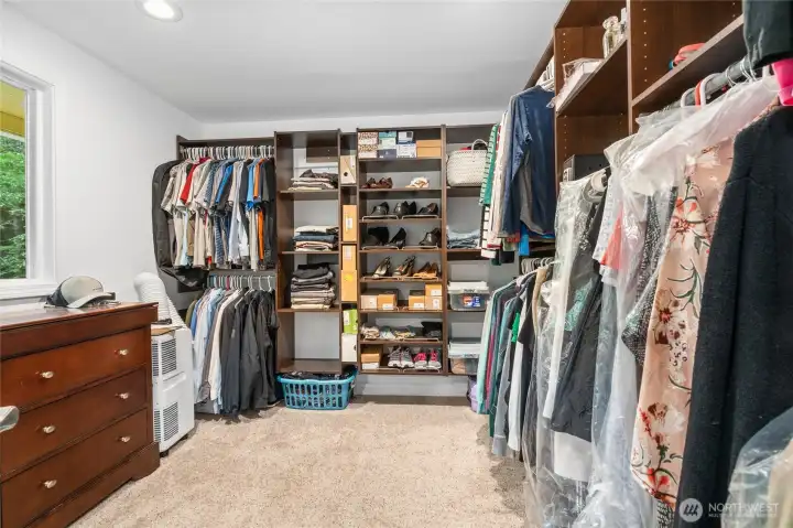 Owner Suite with huge walk-in closet, windows to backyard, en-suite bathroom with 2 sinks and large glass shower!