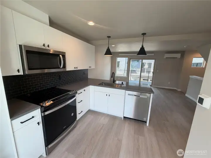 Picture of 680 W Kline Rd. View of kitchen looking towards living/deck