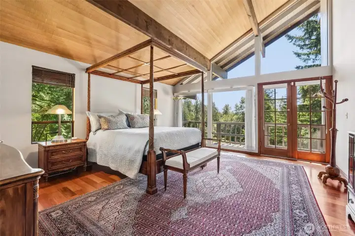 Primary bedroom with walk out balcony