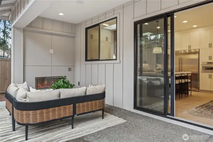Covered patio with gas fireplace makes for cozy evenings