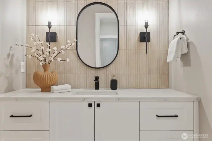 Beautiful tile accent wall in the powder bath