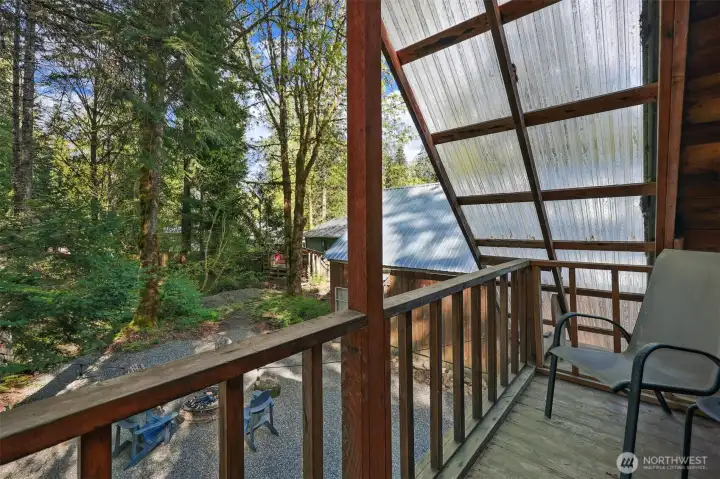2nd Floor Balcony Overlooks Backyard with Firepit