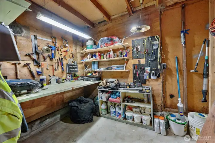 Large Shop Area with Stairs Leading to Unfinished Upper Level