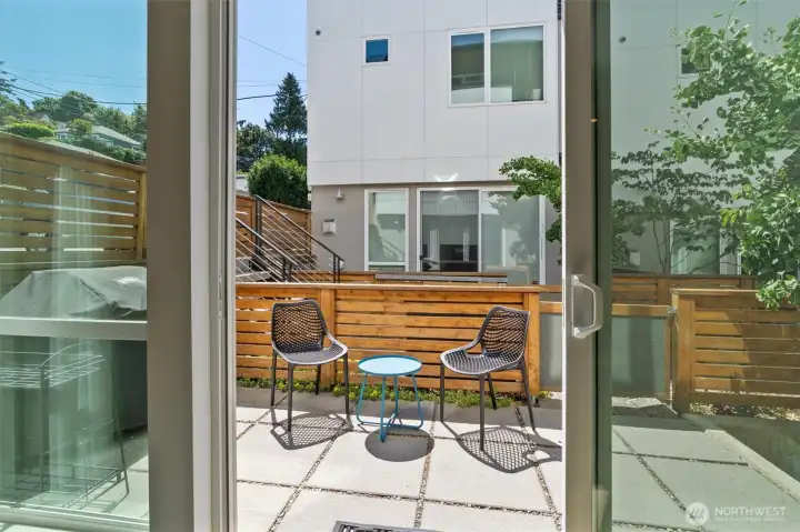 Fenced and private, low-maintenance patio. Fenced and private, low-maintenance patio.