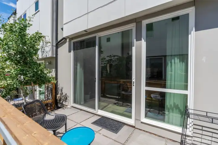 Fenced and private, low-maintenance patio. Fenced and private, low-maintenance patio.