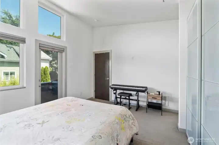 The primary suite is a private retreat featuring beautiful views, a step-out balcony, high & vaulted ceilings, multiple closets with custom built-in shelving, special lighting, and en suite bath. The primary suite is a private retreat featuring beautiful views, a step-out balcony, high & vaulted ceilings, multiple closets with custom built-in shelving, special lighting, and en suite bath.