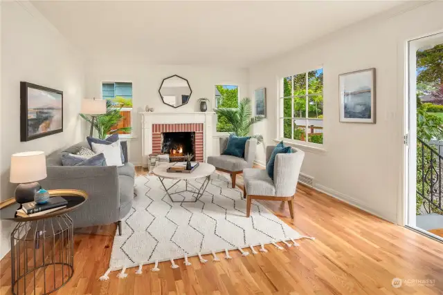 This very large living room features a versatile floorplan and a wood burning fireplace.